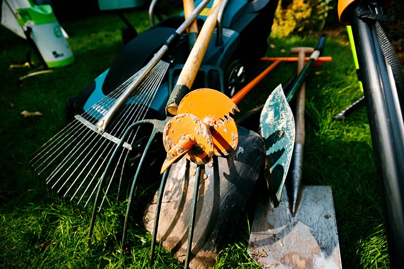 Wear Safety Toe Boots when working with landscape construction tools