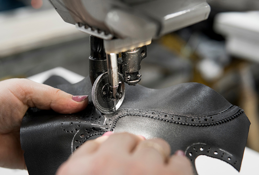 Boot uppers sewn by a leather craftsman