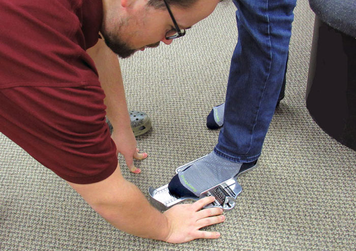 Proper Foot Measuring Being Done by a Trained Professional at Family Footwear Center