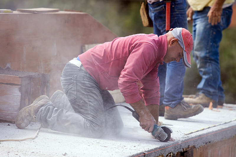 Brick Laying Work can quickly chew up the leather on the toes of Steel Toe Boots